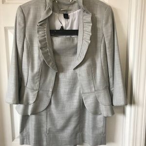 Pencil skirt and ruffled jacket.